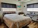 Inviting bedroom featuring a comfortable bed and ample natural light at 8368 Sw 105Th Pl, Ocala, FL 34481