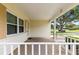 Covered porch showcasing a welcoming entrance and protection from the elements at 8625 Sw 94Th Ln # A, Ocala, FL 34481