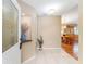 Bright foyer with tile flooring, decorative niche, and views of the dining area at 8670 Se 141St Pl, Summerfield, FL 34491
