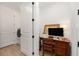 A tidy home office is conveniently located near the laundry room, making multitasking easy at 8989 Sw 57Th Place Rd, Ocala, FL 34481