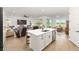 Open concept floorplan combining kitchen, living and dining areas with modern fixtures and finishes at 8989 Sw 57Th Place Rd, Ocala, FL 34481