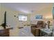 Comfortable living room featuring an entertainment area and cozy recliners at 9486 Se 173Rd Pl, Summerfield, FL 34491