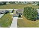 Aerial view of home with a large, fenced backyard and mature tree at 9952 Sw 58Th Ave, Ocala, FL 34476