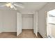 Bedroom closet featuring neutral walls and white shelving at 9952 Sw 58Th Ave, Ocala, FL 34476