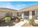 Inviting front entrance with colorful flowers and manicured shrubs at 9952 Sw 58Th Ave, Ocala, FL 34476