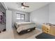 Bedroom with a window, neutral carpeting, and a closet at 10210 Sw 93Rd Ave, Ocala, FL 34481