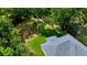 An aerial view of the home showing the roof and lawn at 10675 Sw 69Th Ter, Ocala, FL 34476