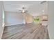 Open living room featuring hardwood floors, recessed lighting, and a neutral color palette at 10675 Sw 69Th Ter, Ocala, FL 34476