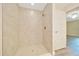 Tiled shower featuring a shower head and tiled flooring at 10675 Sw 69Th Ter, Ocala, FL 34476