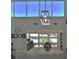 Dining area with beautiful lake views, lots of natural light, and views of the pool at 10893 Se 141 Avenue Rd, Ocklawaha, FL 32179