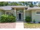 Charming single-story home with well-manicured landscaping and a welcoming front entrance at 11645 Mallard Ct, Dunnellon, FL 34432