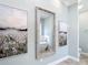 Charming bathroom featuring marble floors and wall art at 15620 Nw 112Th Ave, Reddick, FL 32686