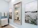 Charming bathroom featuring marble floors and wall art at 15620 Nw 112Th Ave, Reddick, FL 32686