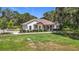 An eye-level exterior view of the house with manicured lawn at 15620 Nw 112Th Ave, Reddick, FL 32686