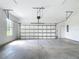 Bright, spacious two-car garage with an automatic door opener at 15620 Nw 112Th Ave, Reddick, FL 32686