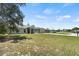 A single story home with a well-manicured front lawn at 15994 Sw 55Th Avenue Rd, Ocala, FL 34473