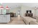 Bright living area seamlessly flows into the dining space, offering an inviting atmosphere at 15994 Sw 55Th Avenue Rd, Ocala, FL 34473