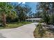 Charming home showcasing a long driveway and inviting curb appeal at 16615 Se 63Rd Ln, Ocklawaha, FL 32179