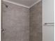 Close-up of shower featuring tiled walls at 16615 Se 63Rd Ln, Ocklawaha, FL 32179