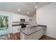 Modern kitchen with stainless steel appliances, granite countertops, and white cabinetry with lots of storage at 17009 Se 60Th St, Ocklawaha, FL 32179