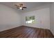 Bright living room featuring new vinyl floors, a ceiling fan, and a front door for easy access at 17009 Se 60Th St, Ocklawaha, FL 32179