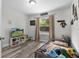 bedroom with a large window and stylish decor at 18 Banyan Pass, Ocala, FL 34472