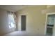 Neutral bedroom features ensuite bathroom and closet at 2002 Enrique Dr, Lady Lake, FL 32159