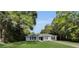 Quaint home with a well-maintained yard and mature trees at 2263 Moines Ct, Dunnellon, FL 34431