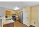 Kitchen features wooden cabinets, stainless steel appliances, and wood flooring at 2263 Moines Ct, Dunnellon, FL 34431