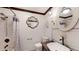 Farmhouse-style bathroom featuring shiplap walls, a vessel sink, and modern fixtures at 2441 Se 38Th St, Ocala, FL 34480