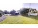 Manicured lawn and mature trees accentuate the exterior of this home at 2441 Se 38Th St, Ocala, FL 34480