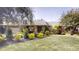 Charming home with stone accents, mature trees, and lush landscaping at 2441 Se 38Th St, Ocala, FL 34480