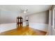 Inviting living room featuring hardwood floors and wainscotting detail at 2441 Se 38Th St, Ocala, FL 34480