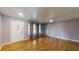 Spacious living room with hardwood floors, large windows, and a bright, airy feel at 2441 Se 38Th St, Ocala, FL 34480