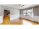 Bright living room offering hardwood floors, wainscotting and views of the pool and fireplace at 2441 Se 38Th St, Ocala, FL 34480