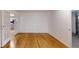 Bright living room featuring hardwood floors, garage access, and an open layout at 2441 Se 38Th St, Ocala, FL 34480