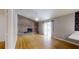 Spacious living room with a fireplace and sliding glass door access to the outside at 2441 Se 38Th St, Ocala, FL 34480