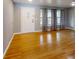 Inviting living room featuring beautiful hardwood floors, natural light, and neutral paint at 2441 Se 38Th St, Ocala, FL 34480