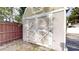 View of backyard shed with double doors and painted trim at 2441 Se 38Th St, Ocala, FL 34480