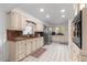Well-lit kitchen featuring modern appliances and ample counter space for cooking and entertaining at 3000 Pine Grove Ln, Lady Lake, FL 32159