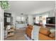 Cozy, light-filled living room with a sofa, daybed, and lots of natural light at 3000 Pine Grove Ln, Lady Lake, FL 32159