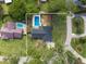 Aerial view outlining property lines with backyard swimming pool and surrounding homes at 327 Se 50Th Ave, Ocala, FL 34471