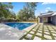 Backyard with a large swimming pool and patio at 327 Se 50Th Ave, Ocala, FL 34471