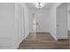Well-lit foyer with clean, white walls and modern hardwood flooring at 327 Se 50Th Ave, Ocala, FL 34471