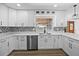 Bright and updated kitchen with stainless steel appliances and quartz countertops at 327 Se 50Th Ave, Ocala, FL 34471
