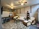 Finished basement with a bar area, casual seating, and a relaxed atmosphere at 3833 Ne 17Th Street Cir, Ocala, FL 34470