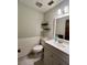 Bathroom with a single sink vanity, floating shelves and tile accents at 3833 Ne 17Th Street Cir, Ocala, FL 34470