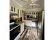 Charming kitchen featuring stainless steel appliances, granite counters and stylish backsplash at 3833 Ne 17Th Street Cir, Ocala, FL 34470