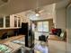 Bright kitchen boasts modern appliances, including a stainless steel refrigerator and sleek countertops at 3833 Ne 17Th Street Cir, Ocala, FL 34470