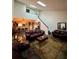 Open living area with vaulted ceilings, modern furnishings, and stylish decor at 3833 Ne 17Th Street Cir, Ocala, FL 34470